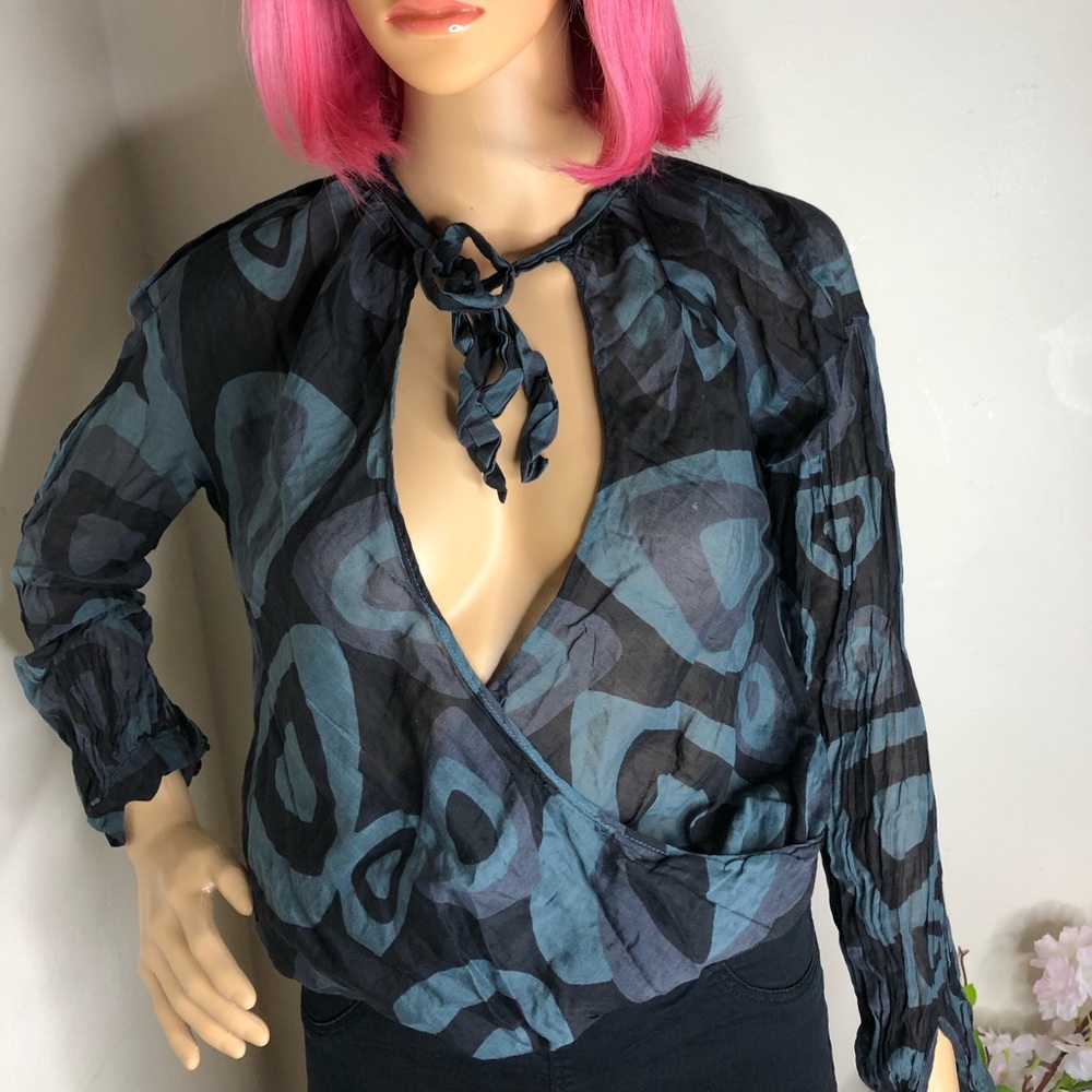 Thin low cut tie front blouse.